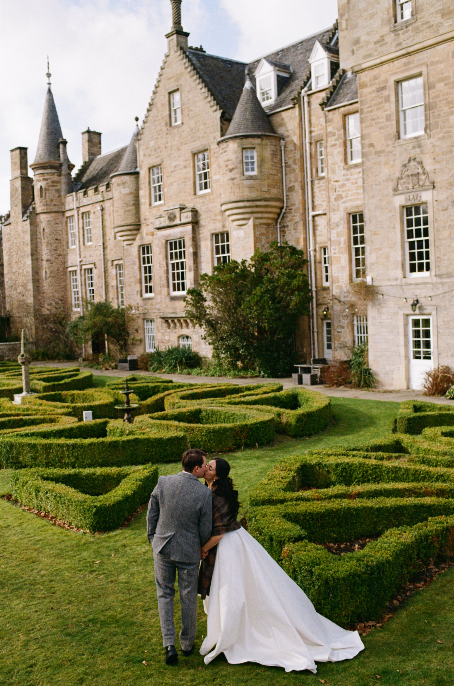 Wedding couple in the gardens of Carberry Tower.