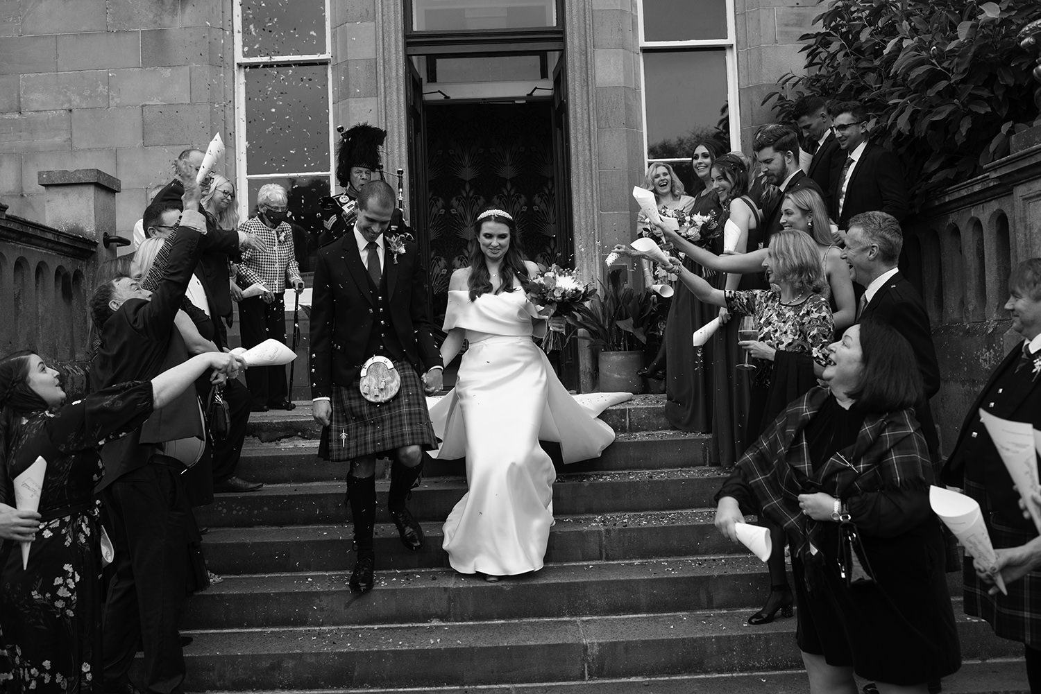 Couple walking down the steps at the Netherbyres.