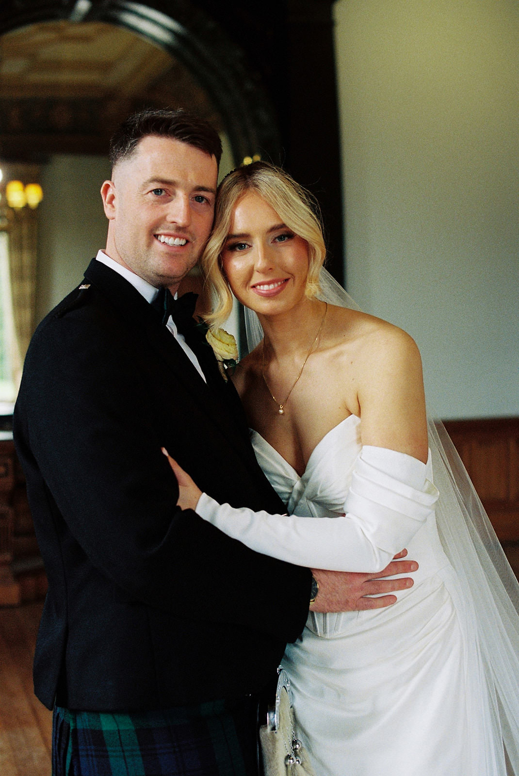 Bride and groom photographed on 35mm film.