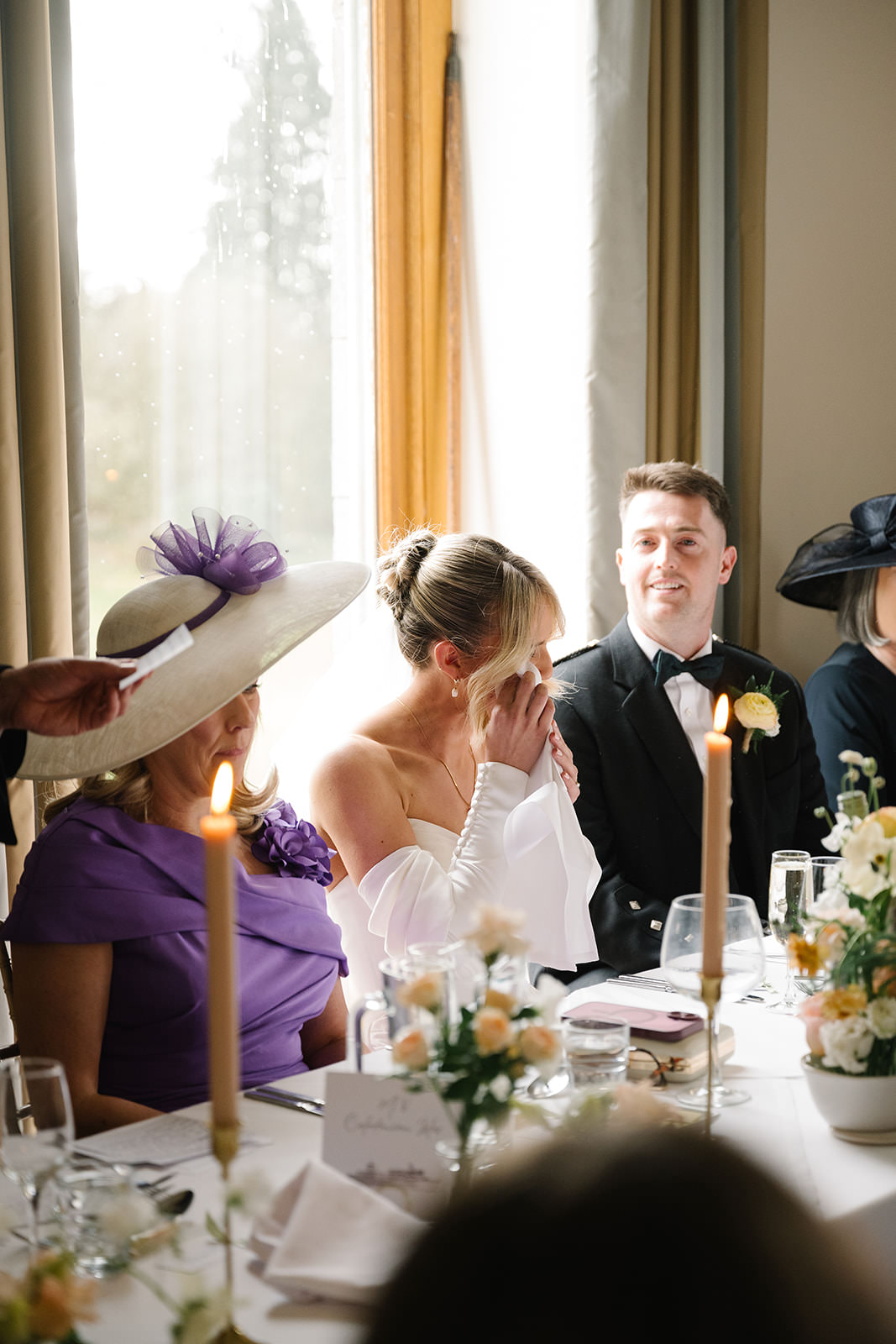 Bride crying during wedding speech.