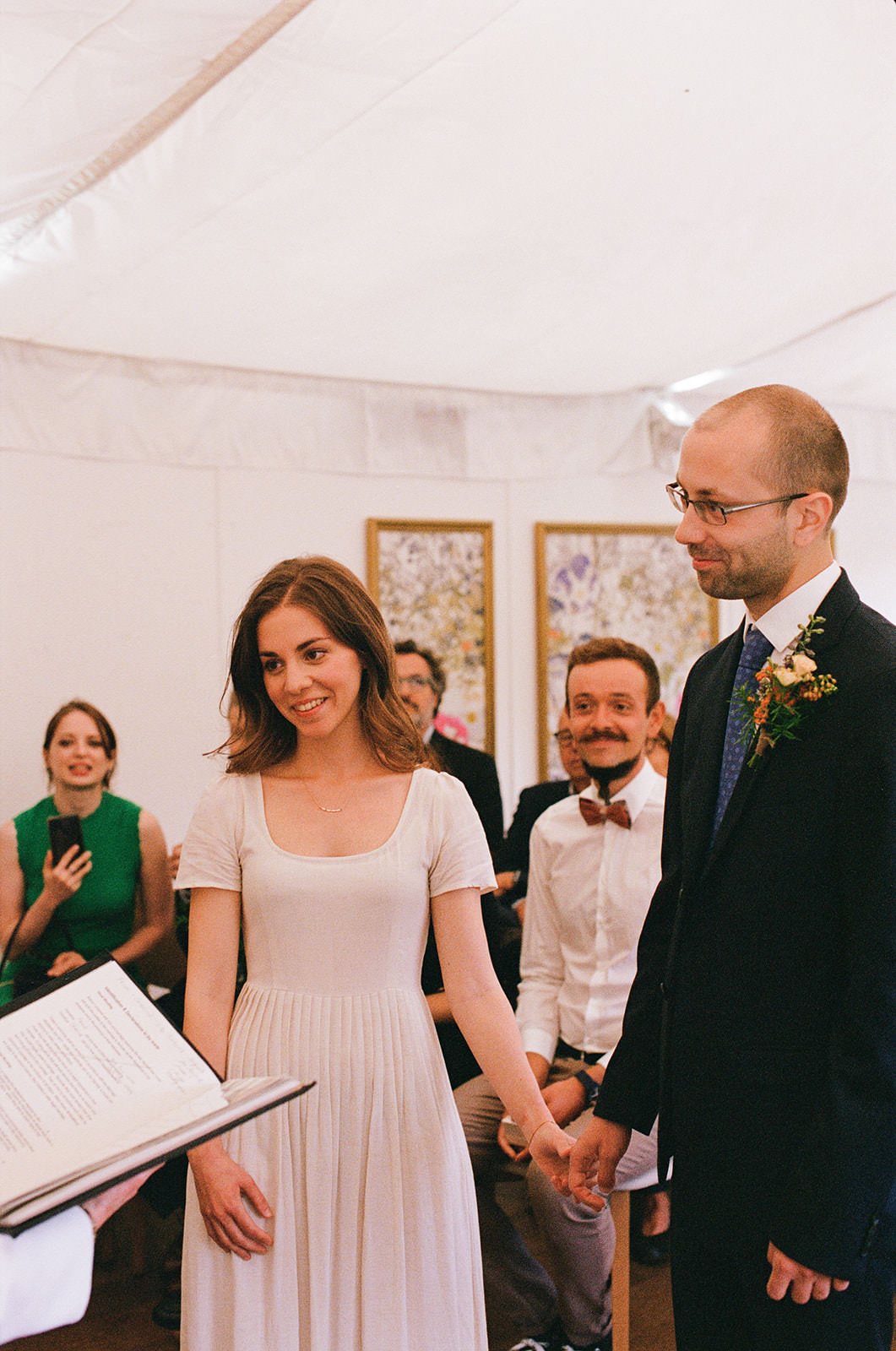 Analogue wedding photo of the couple during their ceremony in edinburgh.