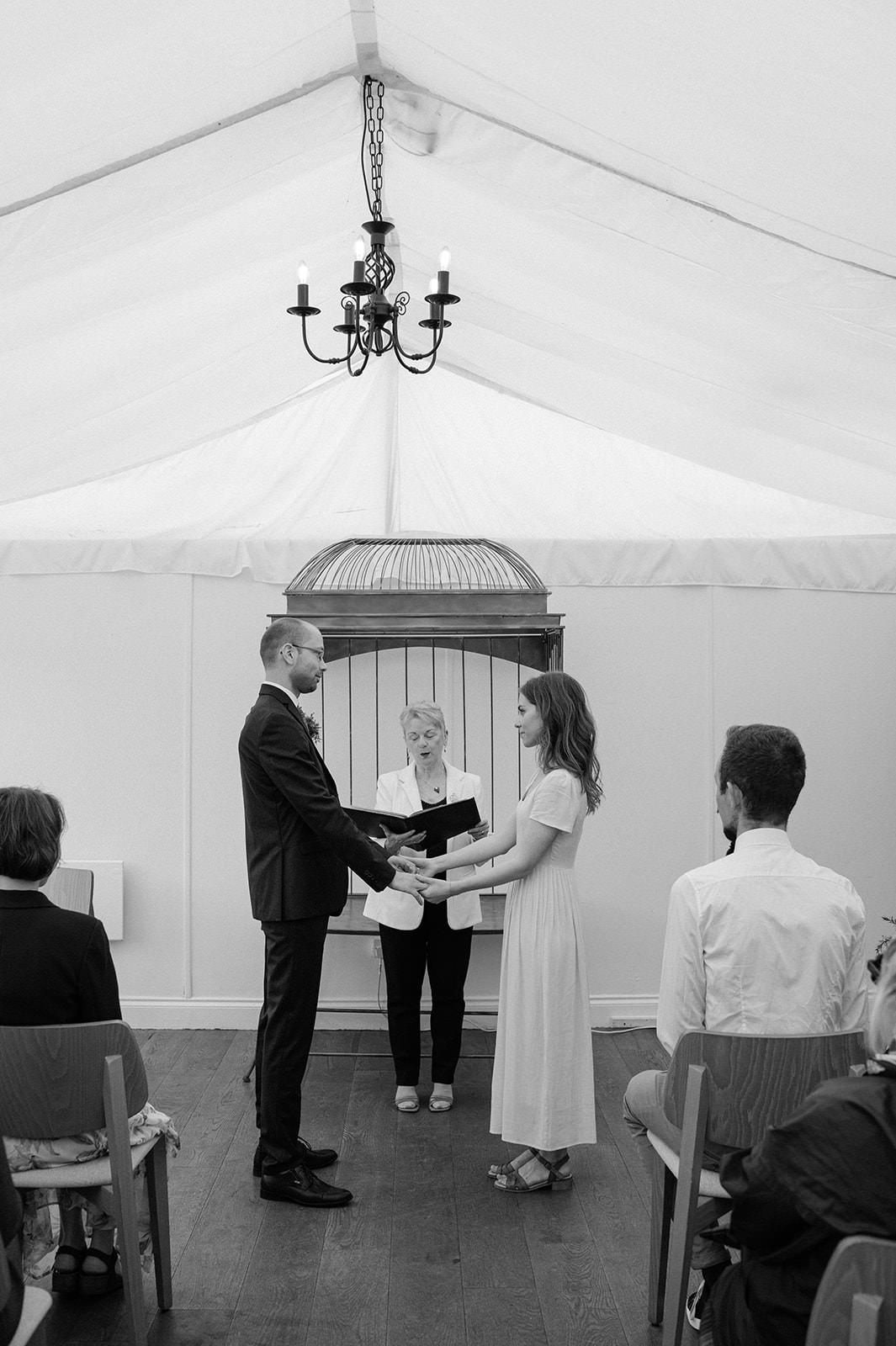 Wedding couple saying vows at the Royal Botanic Gardens in Edinburgh.