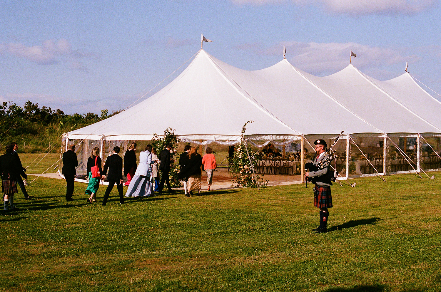 Elegant pitches tent wedding reception at the Cambo House.