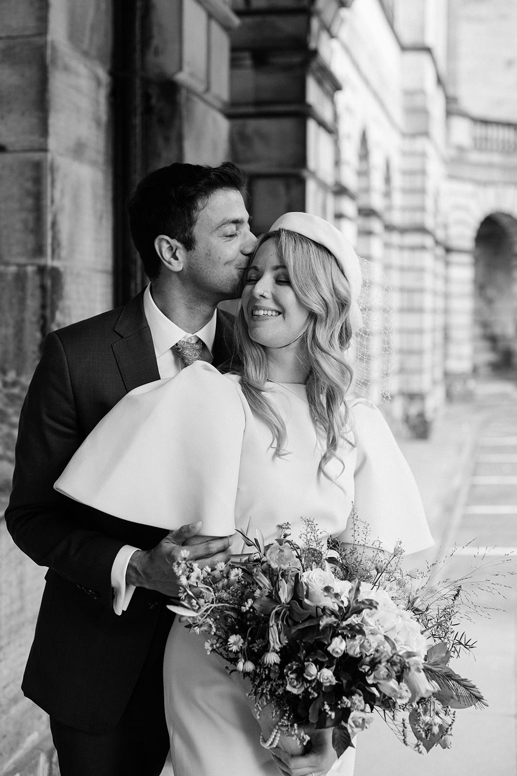 Black and white photo of a wedding couple taken in Edinburgh.