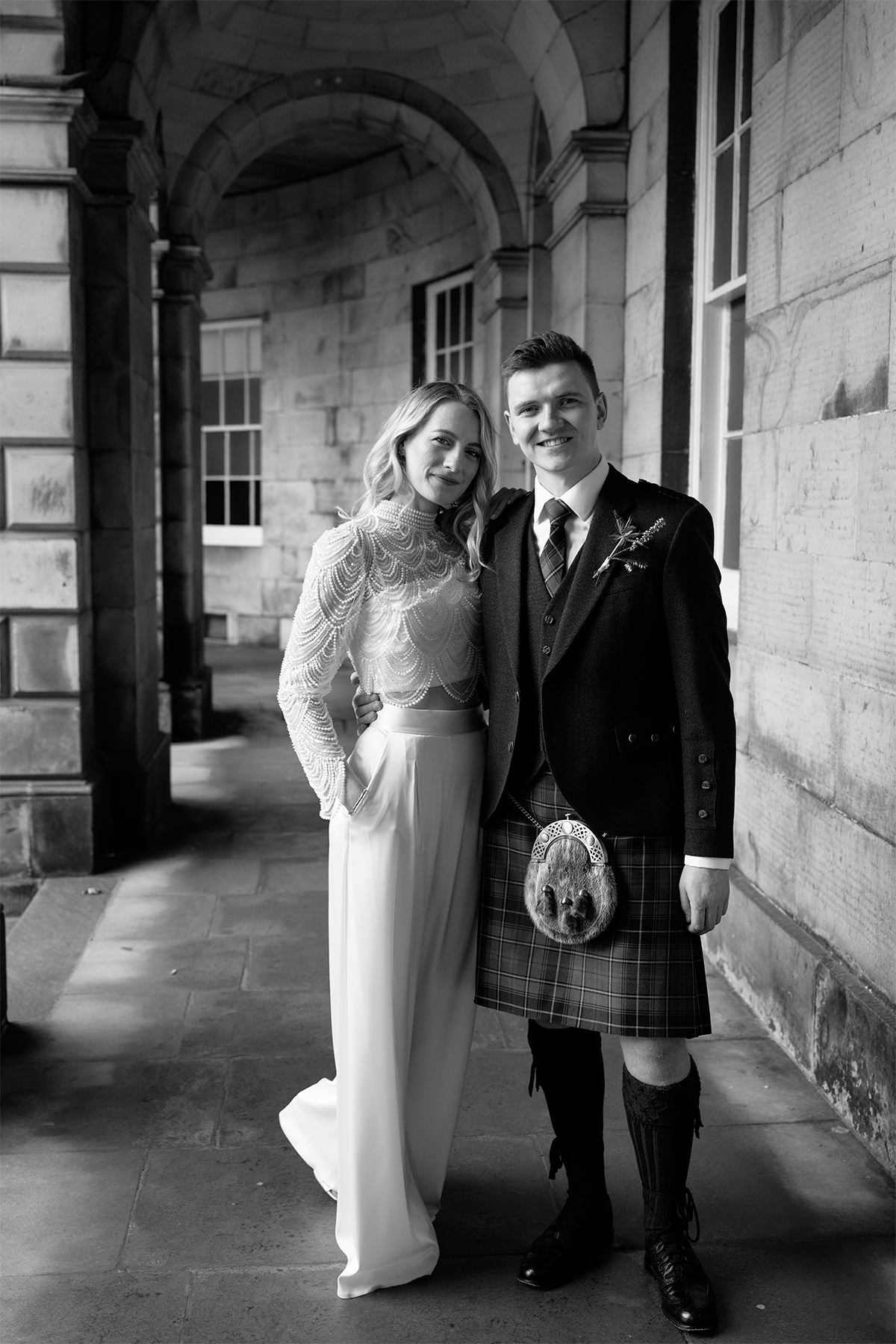 Wedding couple posing for black and white photos in Edinburgh.