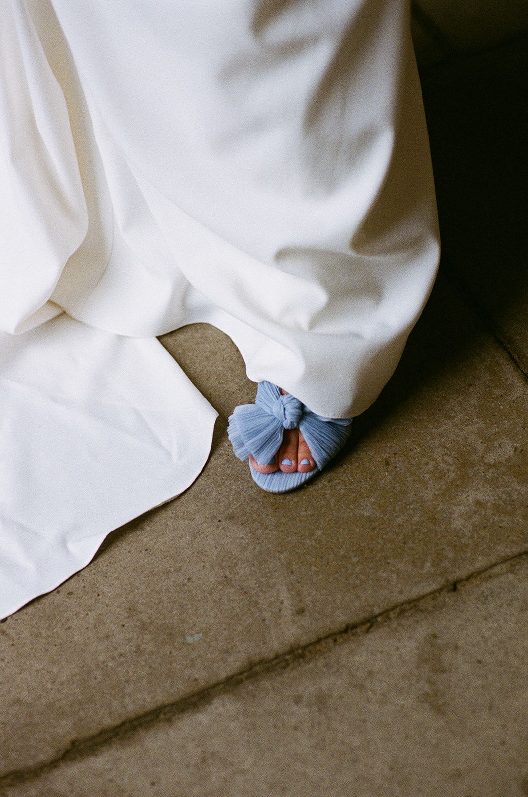 A photo of a bridal blue shoes.