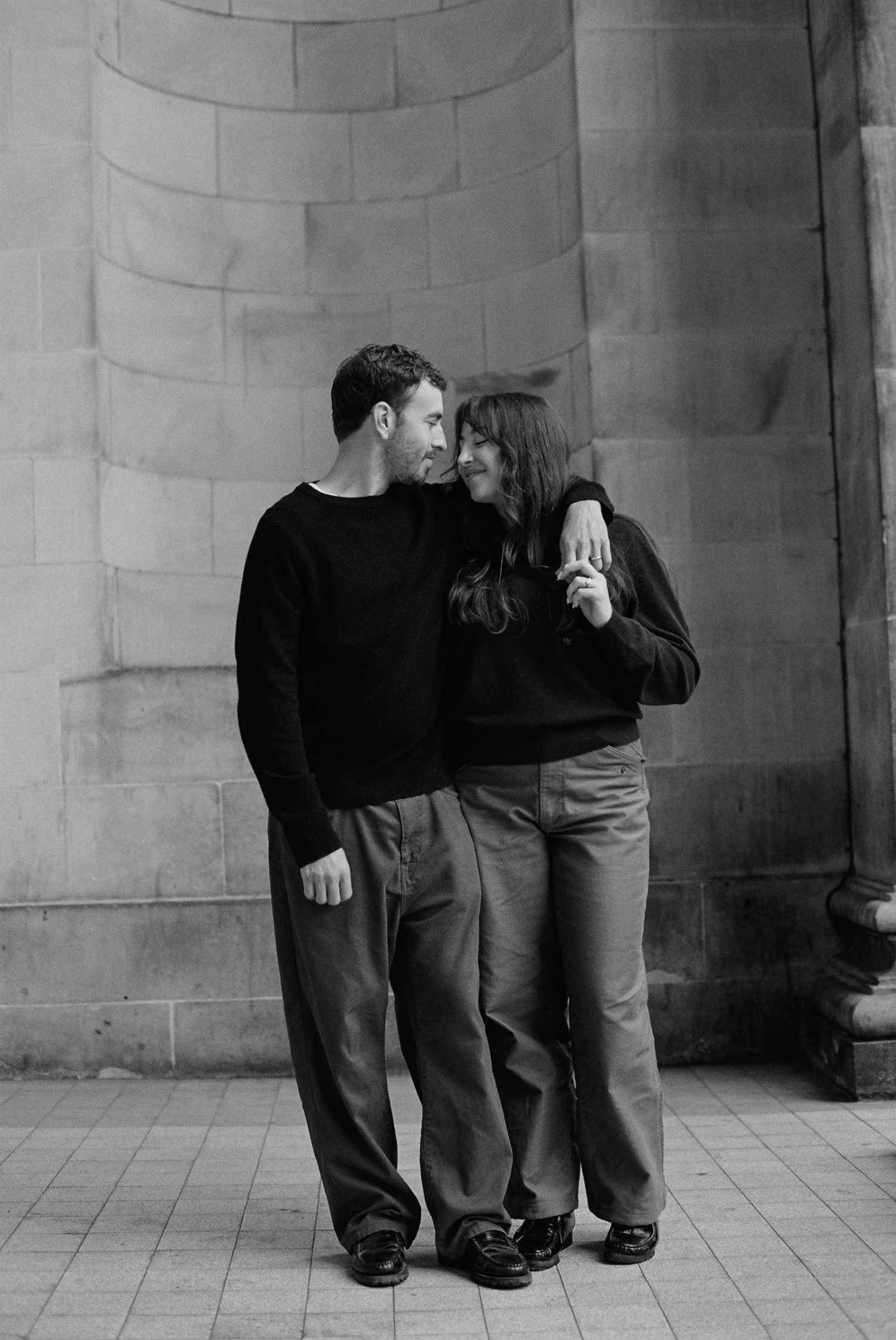 Black and white photo of couple on their honeymooncaptured Edinburgh.