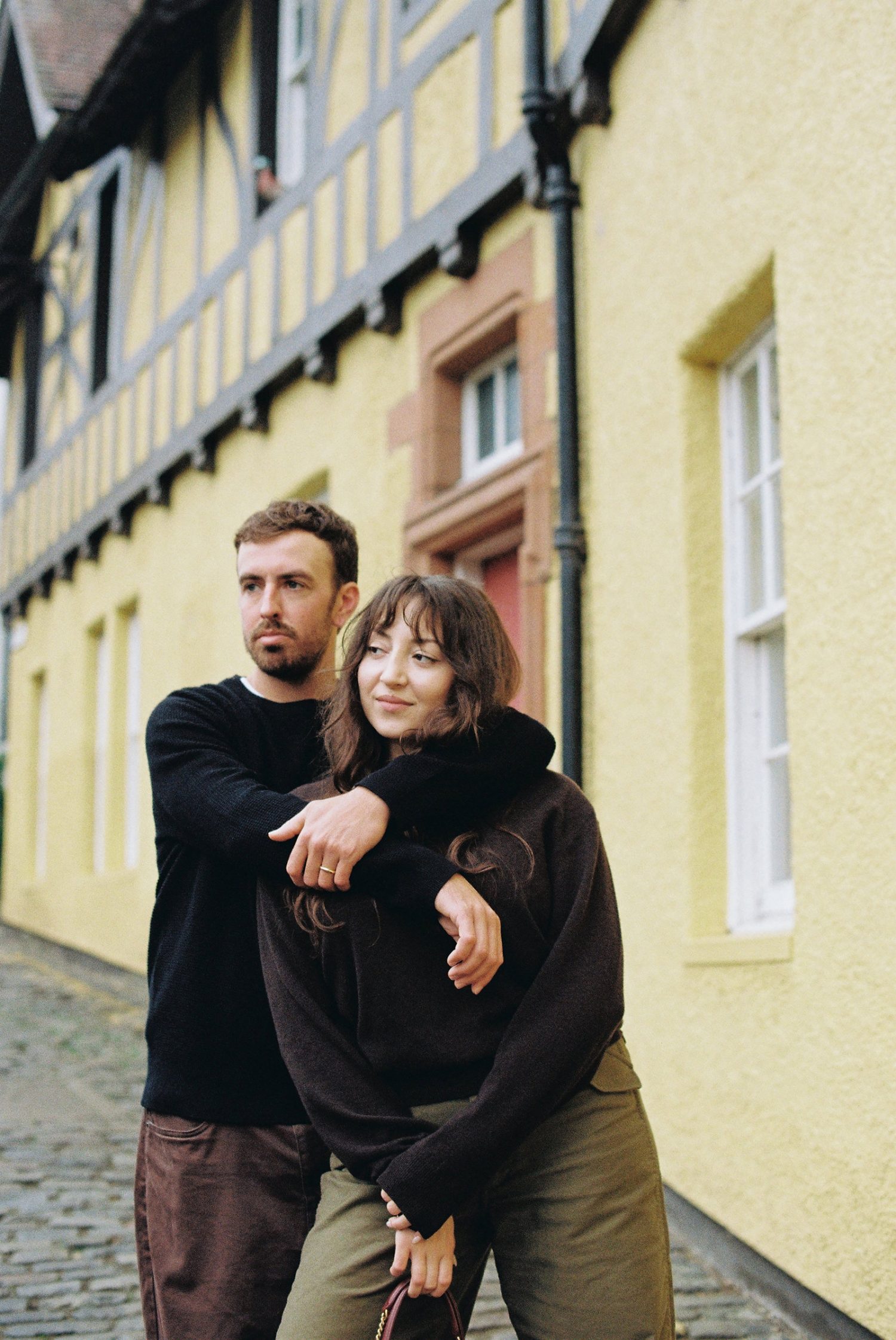 American couple posing for analogue photos in Edinburgh.