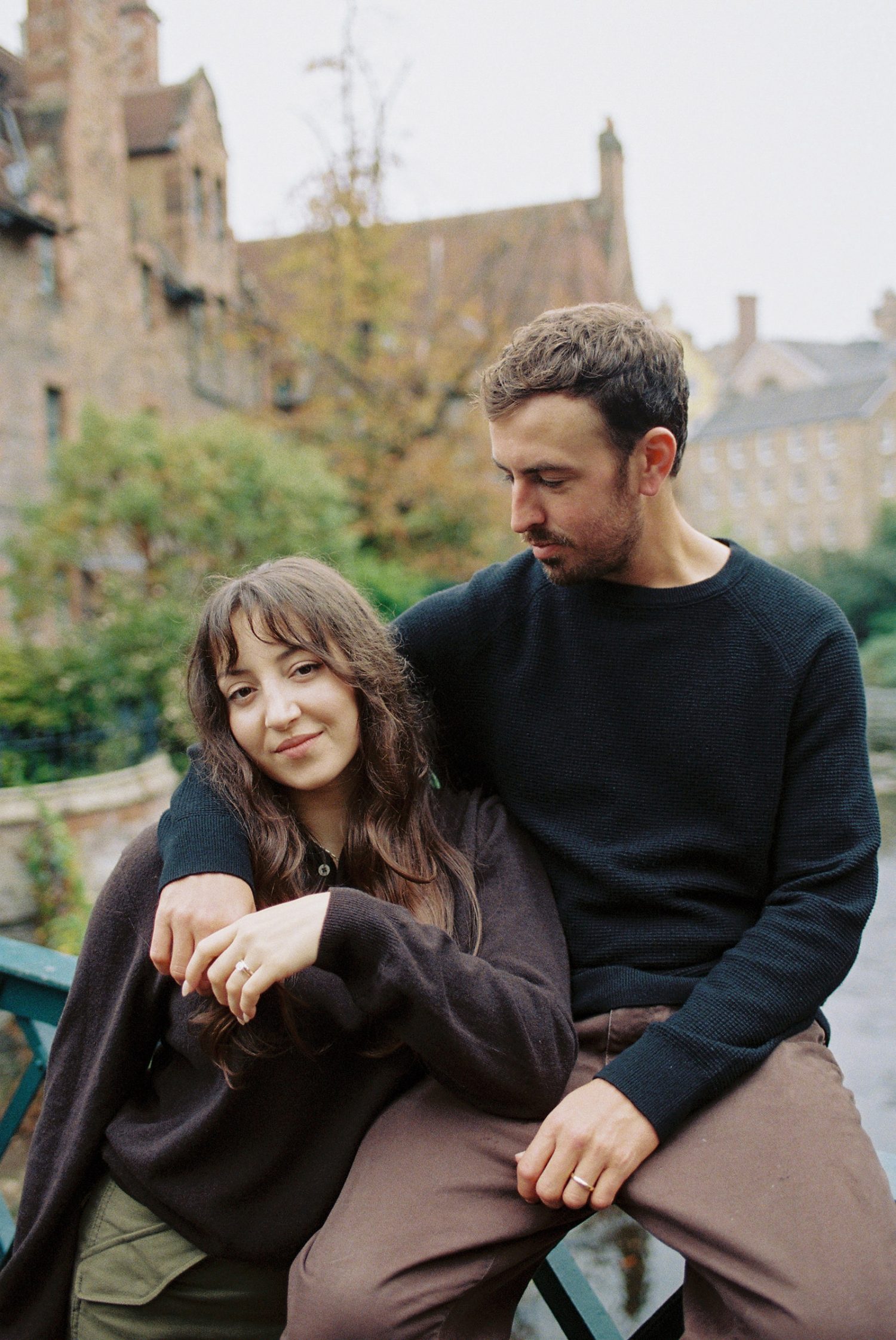 Sara smiling for a camera, photo taken by 35mm film photographer in Scotland.