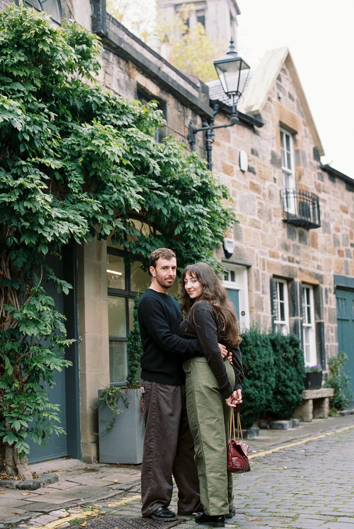 Sara and Brandon posing for lifestyle photos during their honeymoon.