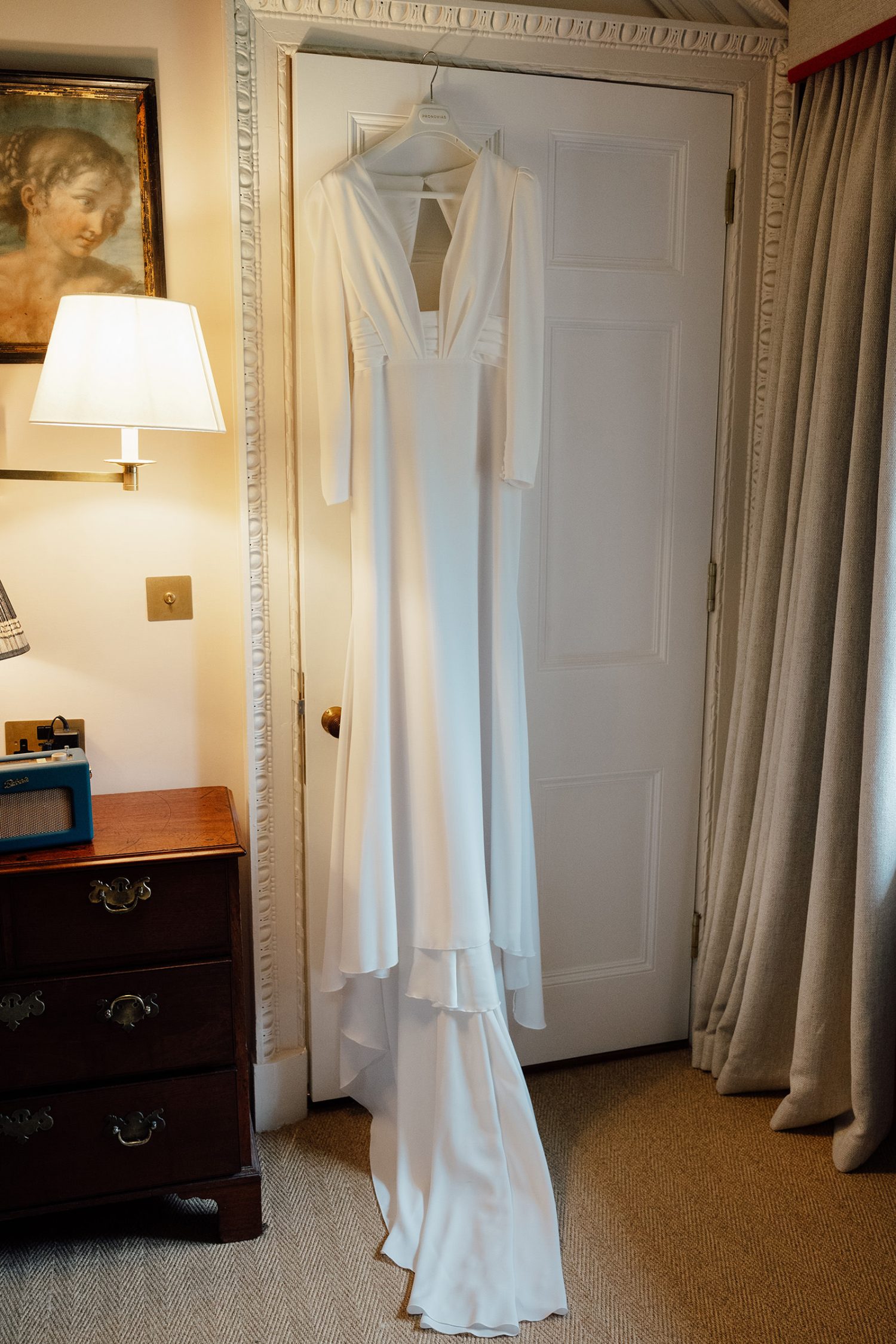 Pronovias bridal dress, hanging on the doors at the Penicuik House.