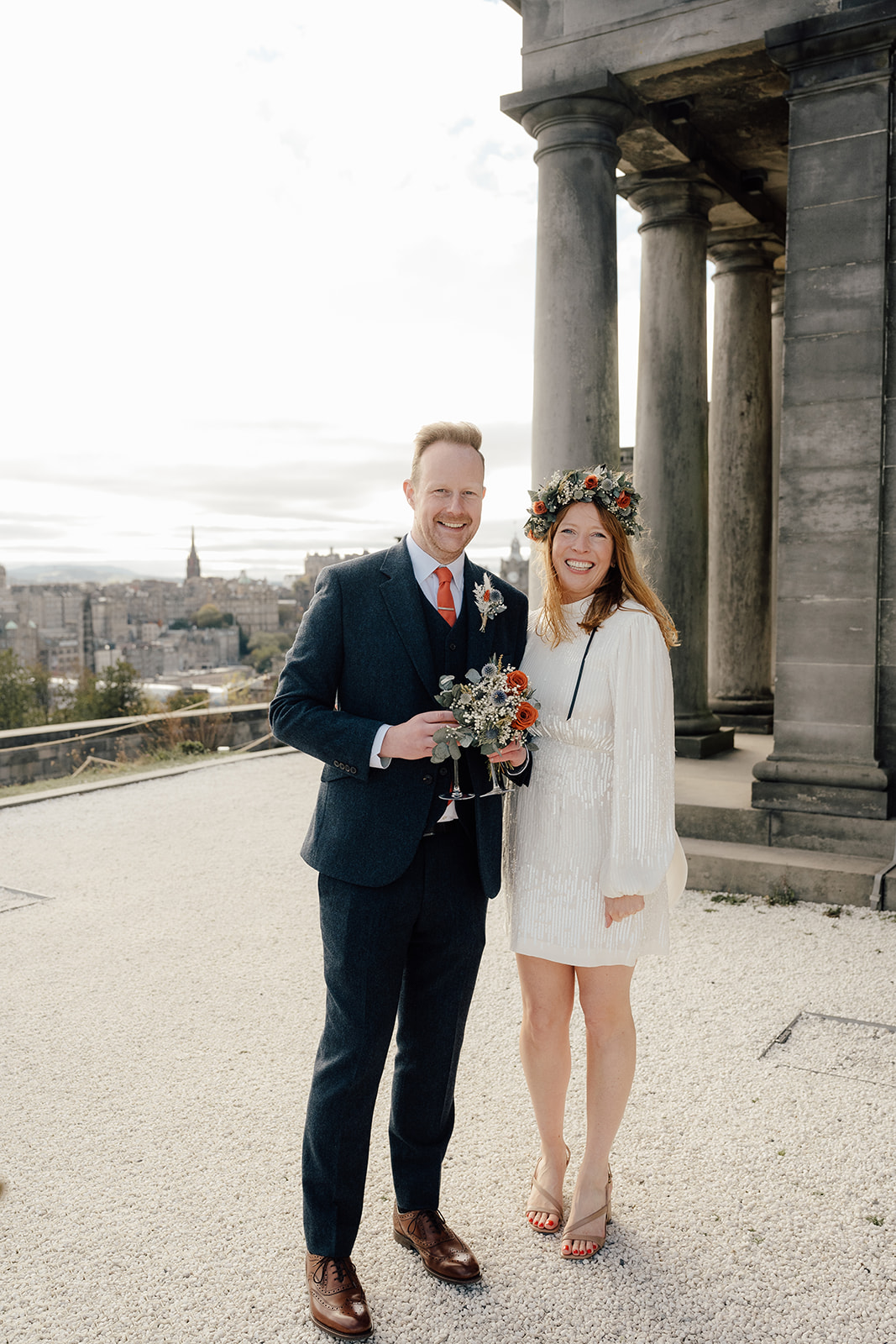 Edinburgh couple photographed on top of the Calton Hill.