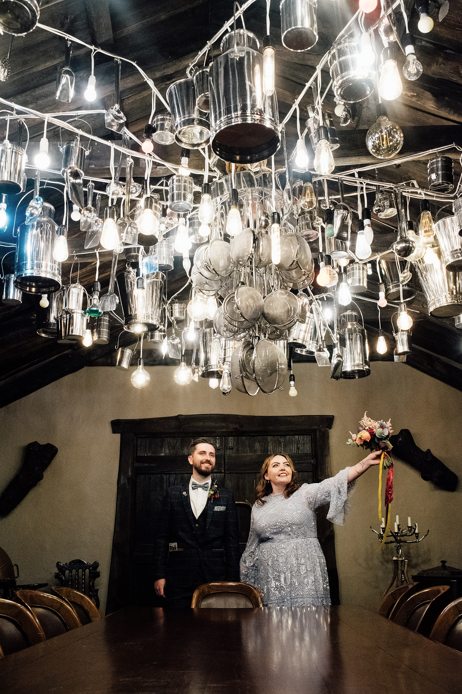 Wedding couple posing for a photo for elopement photographer in Scotland.