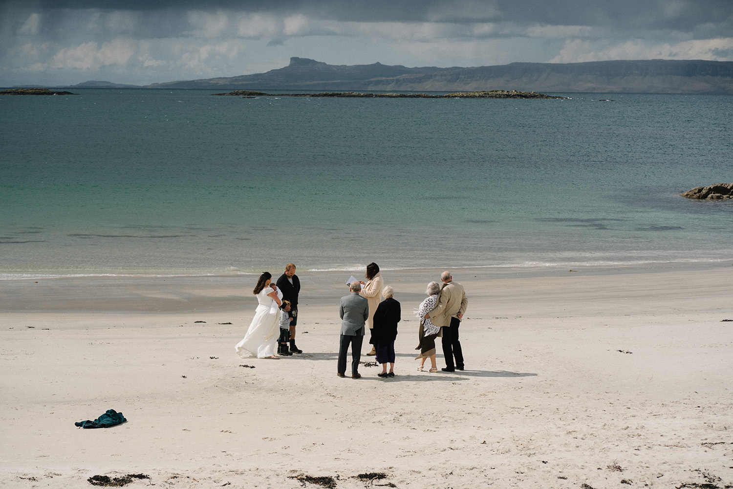 Scotland elopement photographer visiting Camusdarach Beach for a heartfelt ceremony.