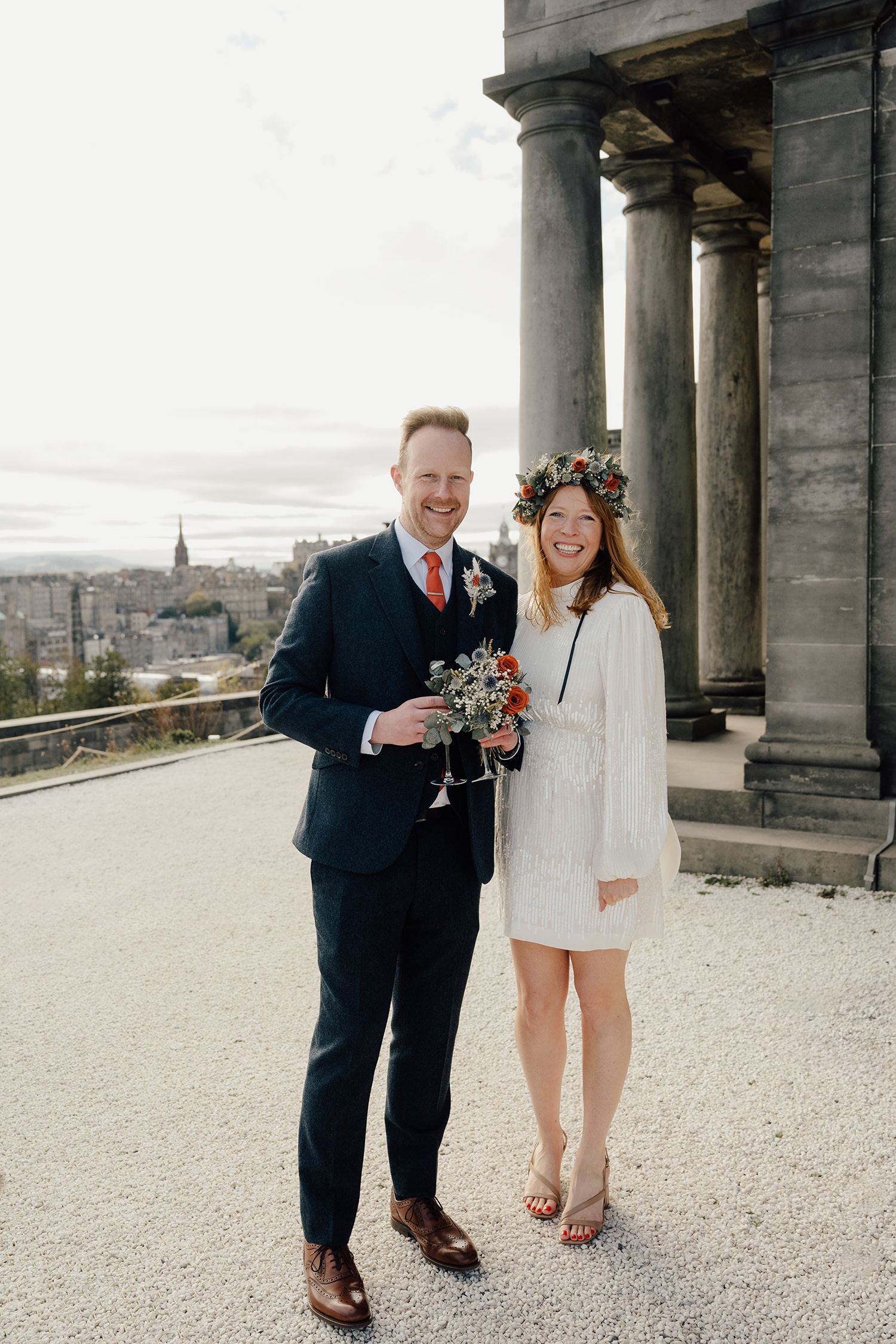 Wedding couple standing outside the Collective, wedding venue in Edinburgh.